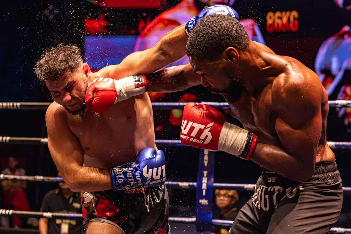 Two fighters trade punches at close range
